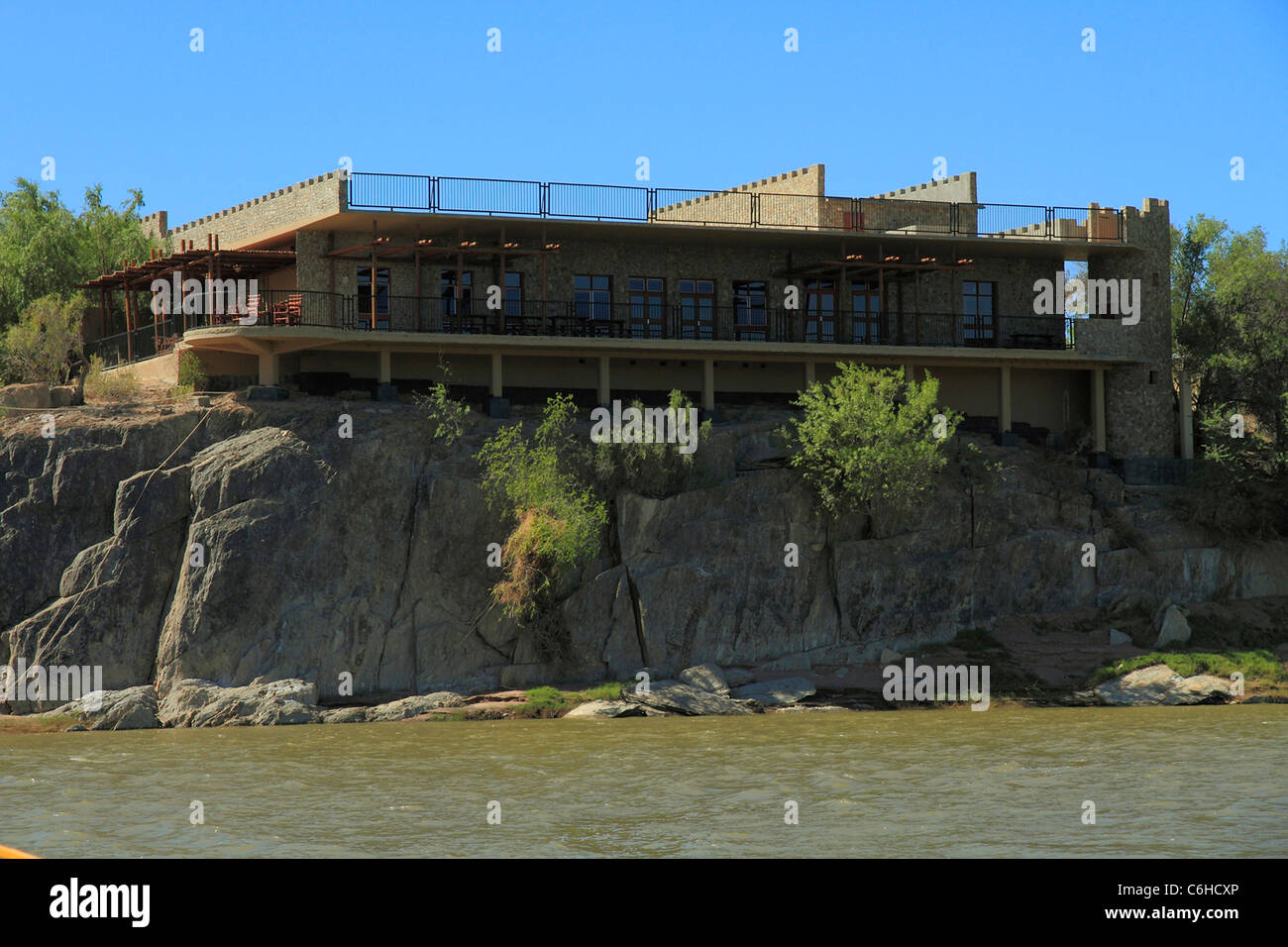 Old castle on the edge of the Orange river Stock Photo