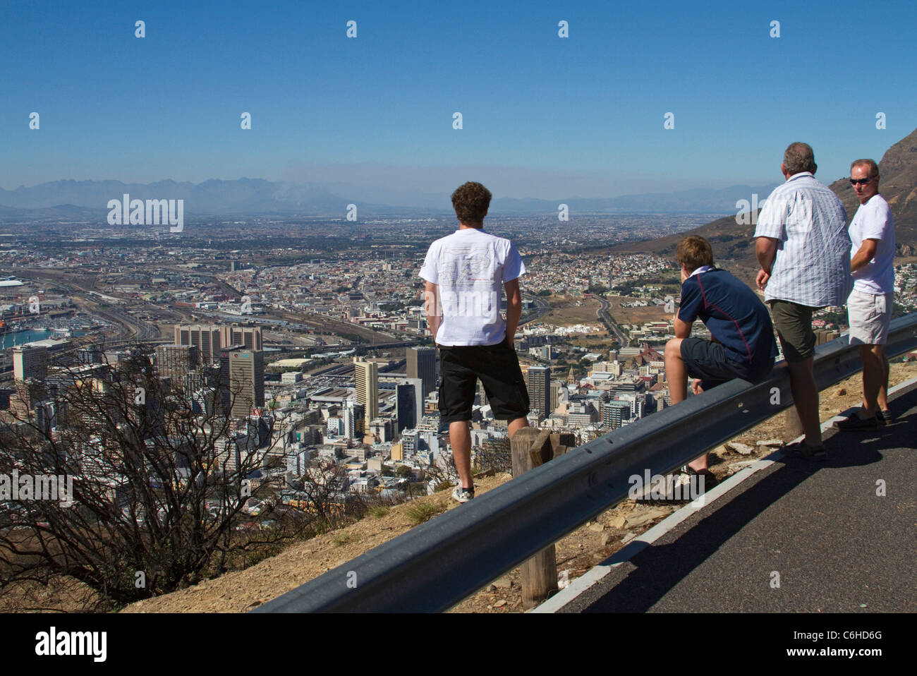 Local tourists take in the view from Signal Hill over Cape Town Stock Photo