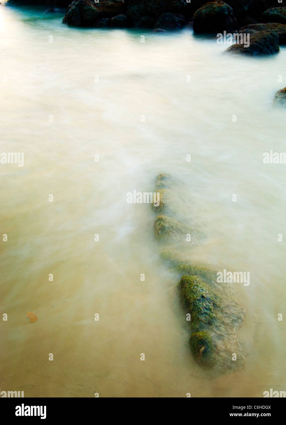 Timelapse rocks pools at sunset Stock Photo Alamy