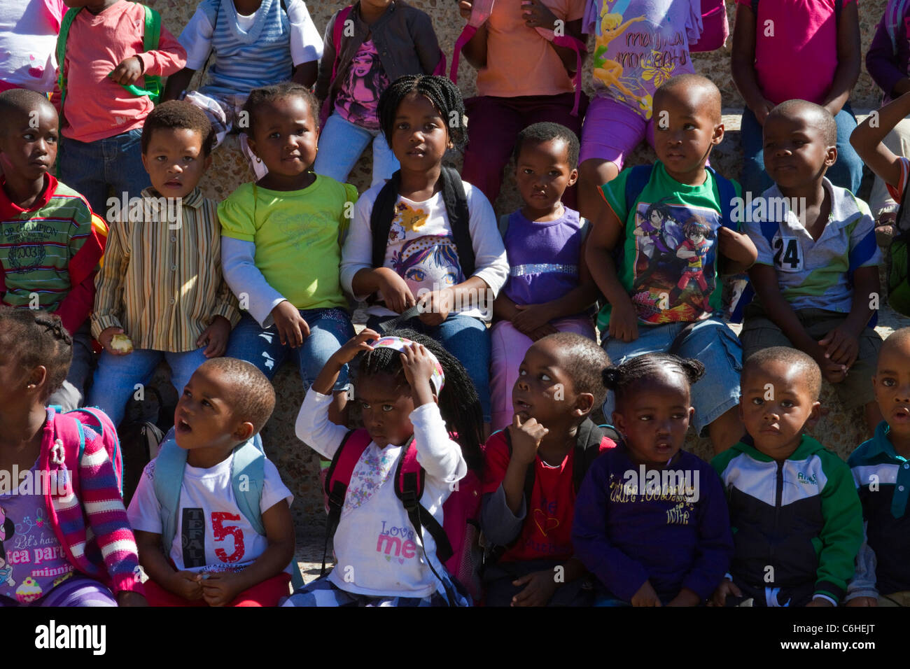 Pre-school children waiting patiently for a boat trip to Robben Island Stock Photo
