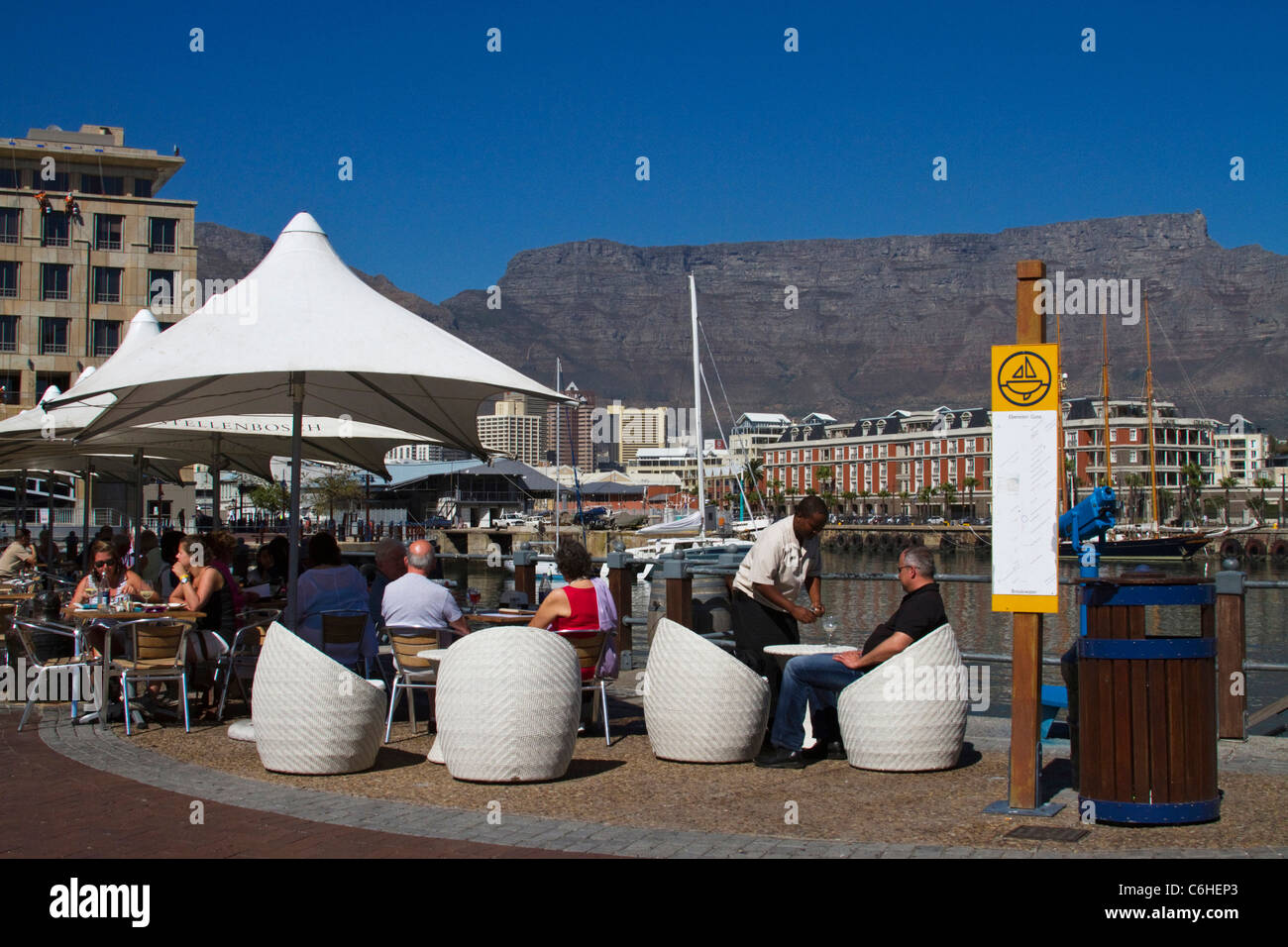 Tourists In An Outdoors Coffee Shop In The Va Waterfront