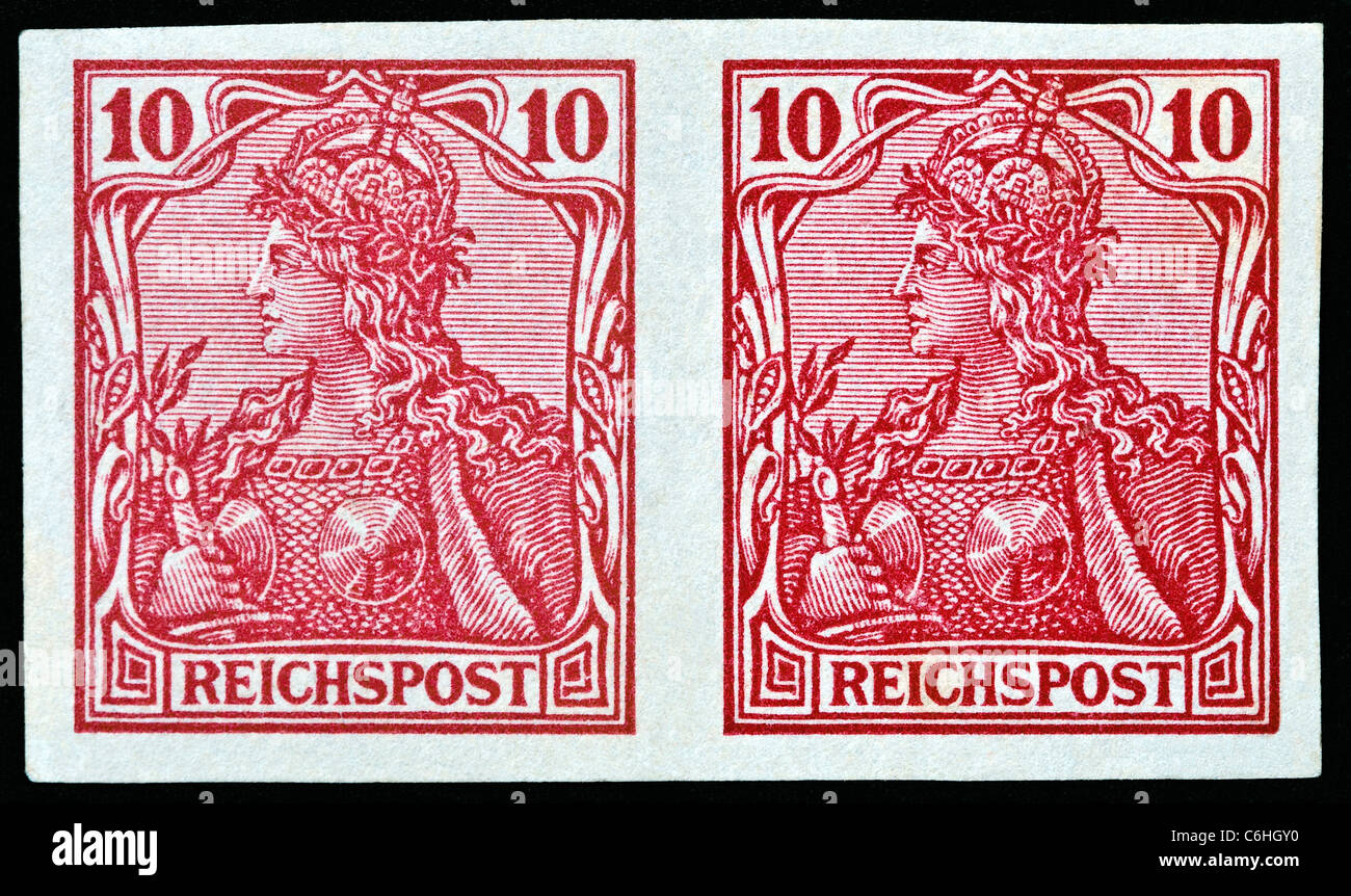 Pair of early forged German Germania stamps. Stock Photo