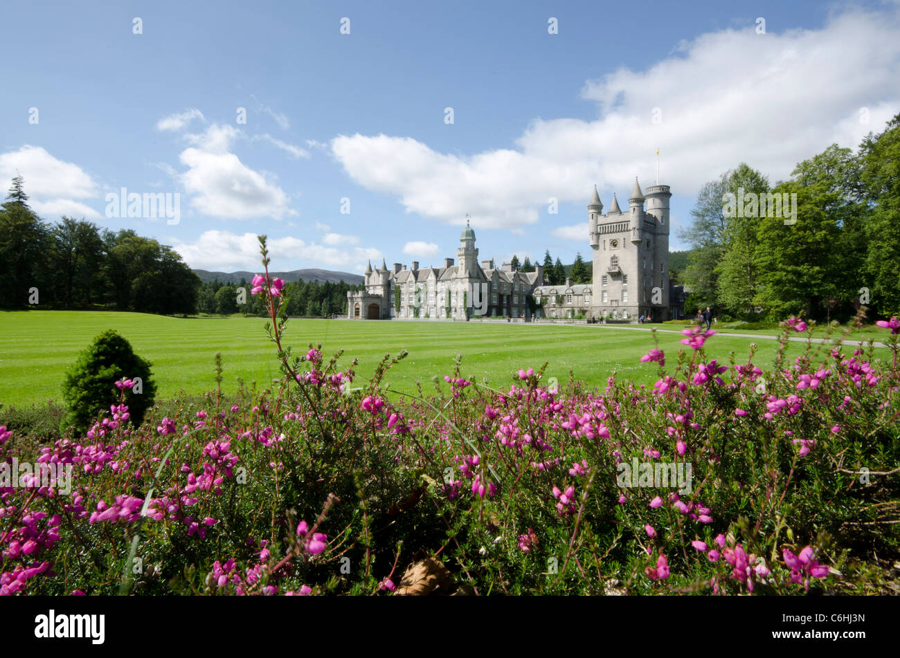 Balmoral Castle Royal Deeside  - Queen's residence view with heather in foreground Stock Photo