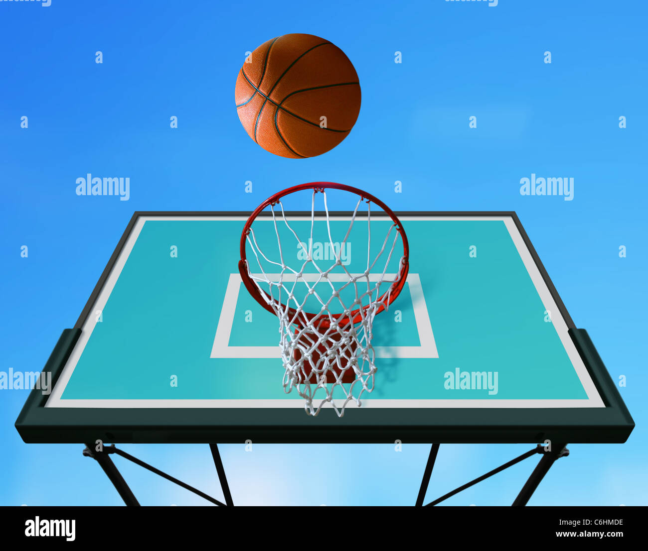 Basketball board and basketball ball on sky background Stock Photo Alamy