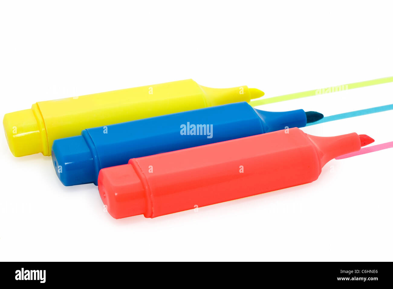 three markers on white background Stock Photo