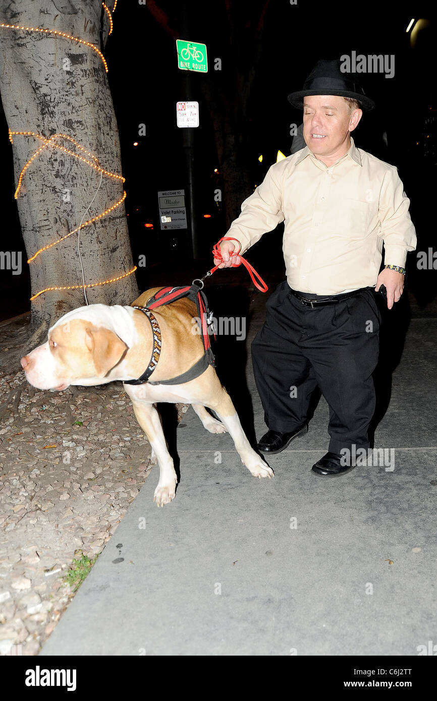 Shorty Rossi star of 'Pit Boss' outside Madeos restaurant with his dog Hercules Los Angeles, California - 17.02.10 Stock Photo