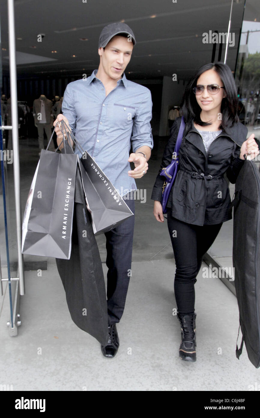 Alex Meraz and Kim Meraz 'The Twilight Saga: New Moon' actor Alex Meraz  leaving Armani Exchange after shopping with his wife Stock Photo - Alamy