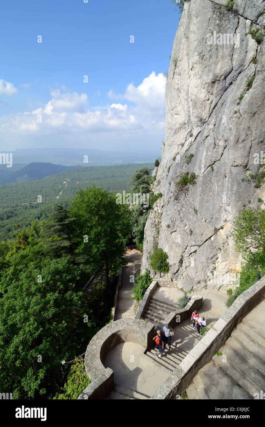Pilgrims on Stairs or Steps Leading to Mary Magdalene Holy Cave or Grotto in the Massif of Sainte-Baume or Sainte Baume Mountain  Provence France Stock Photo
