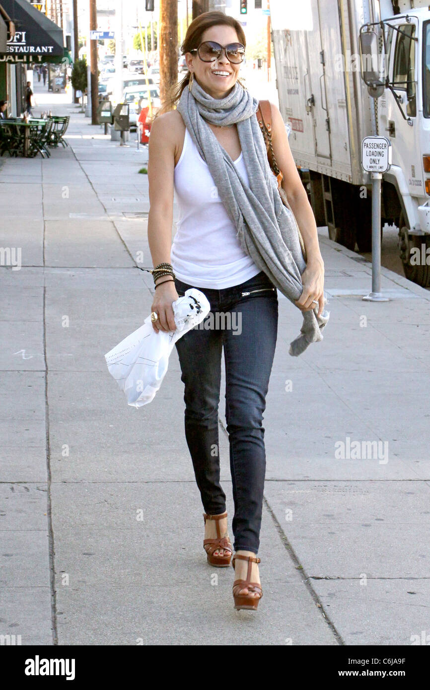 Brooke Burke arriving at a hair salon in West Hollywood while wearing a