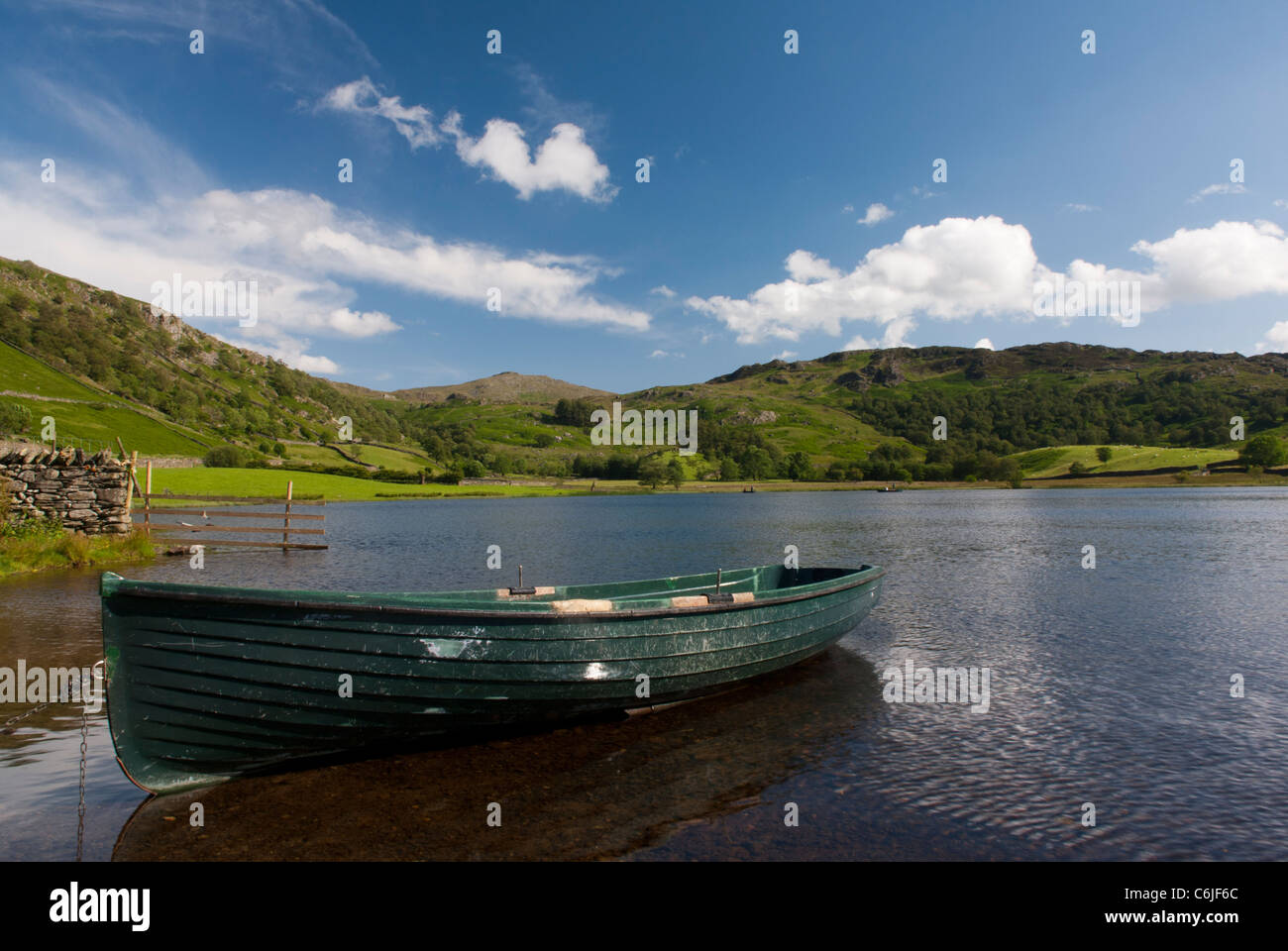 Rowing boat on Watendlath Tarn, Lake District National Park, Cumbria, England. Stock Photo