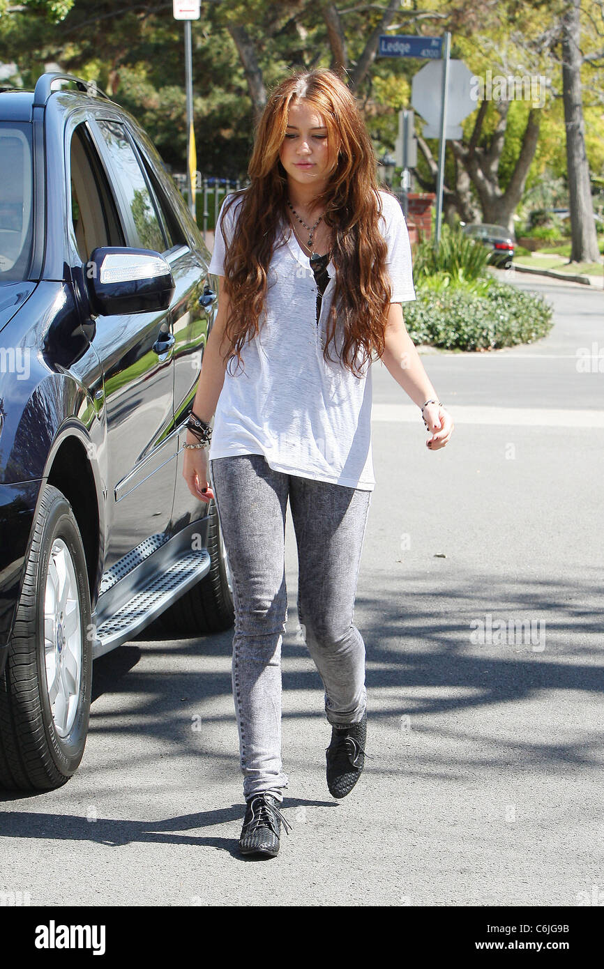 Miley Cyrus shows off her new Mercedes while out and about in Toluca Lake. Los Angeles, California - 15.03.10 Stock Photo