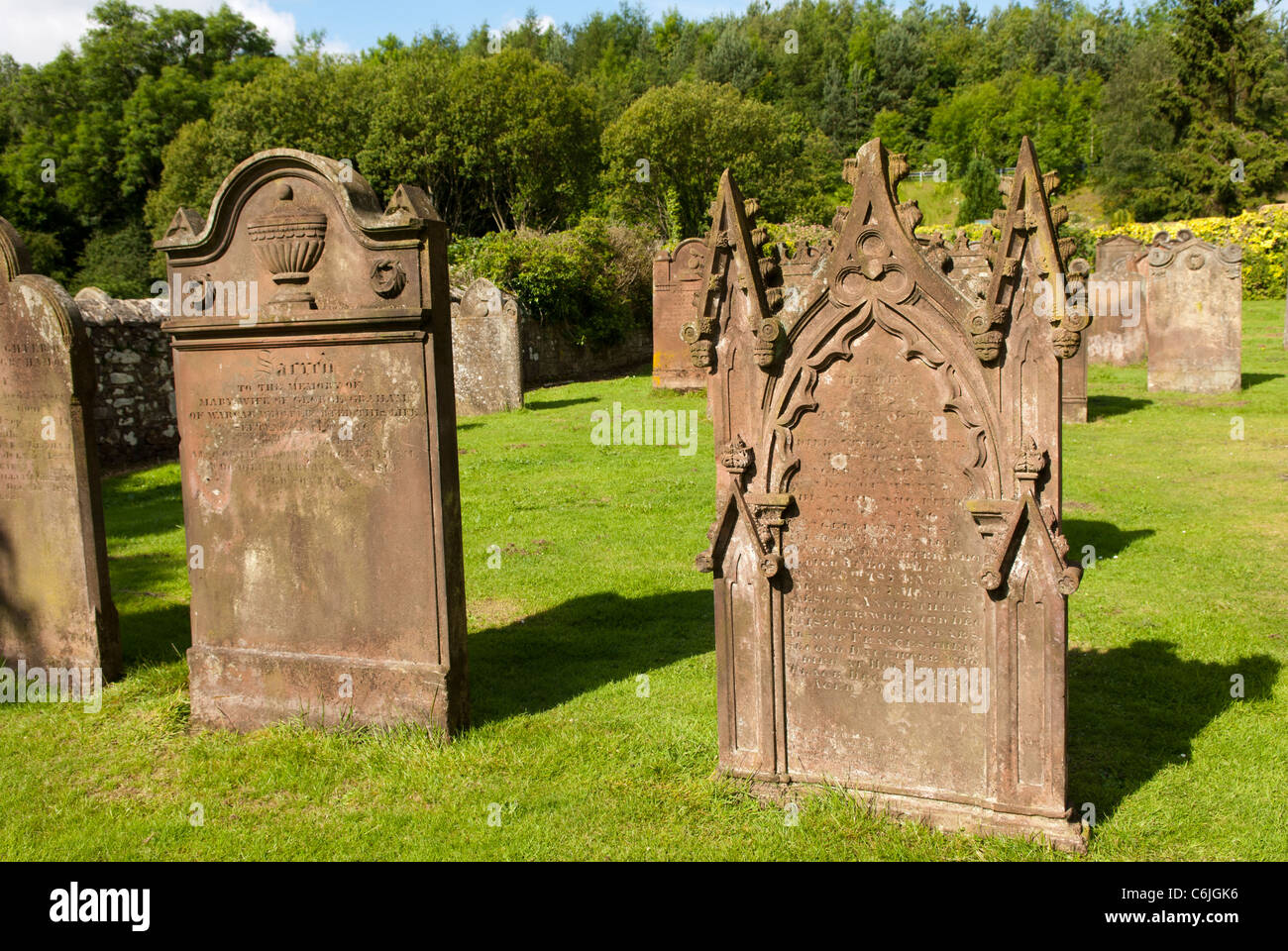 Gravestones at the Parish Church of St Cuthbert, Greenhead, Cumbria, England. Stock Photo