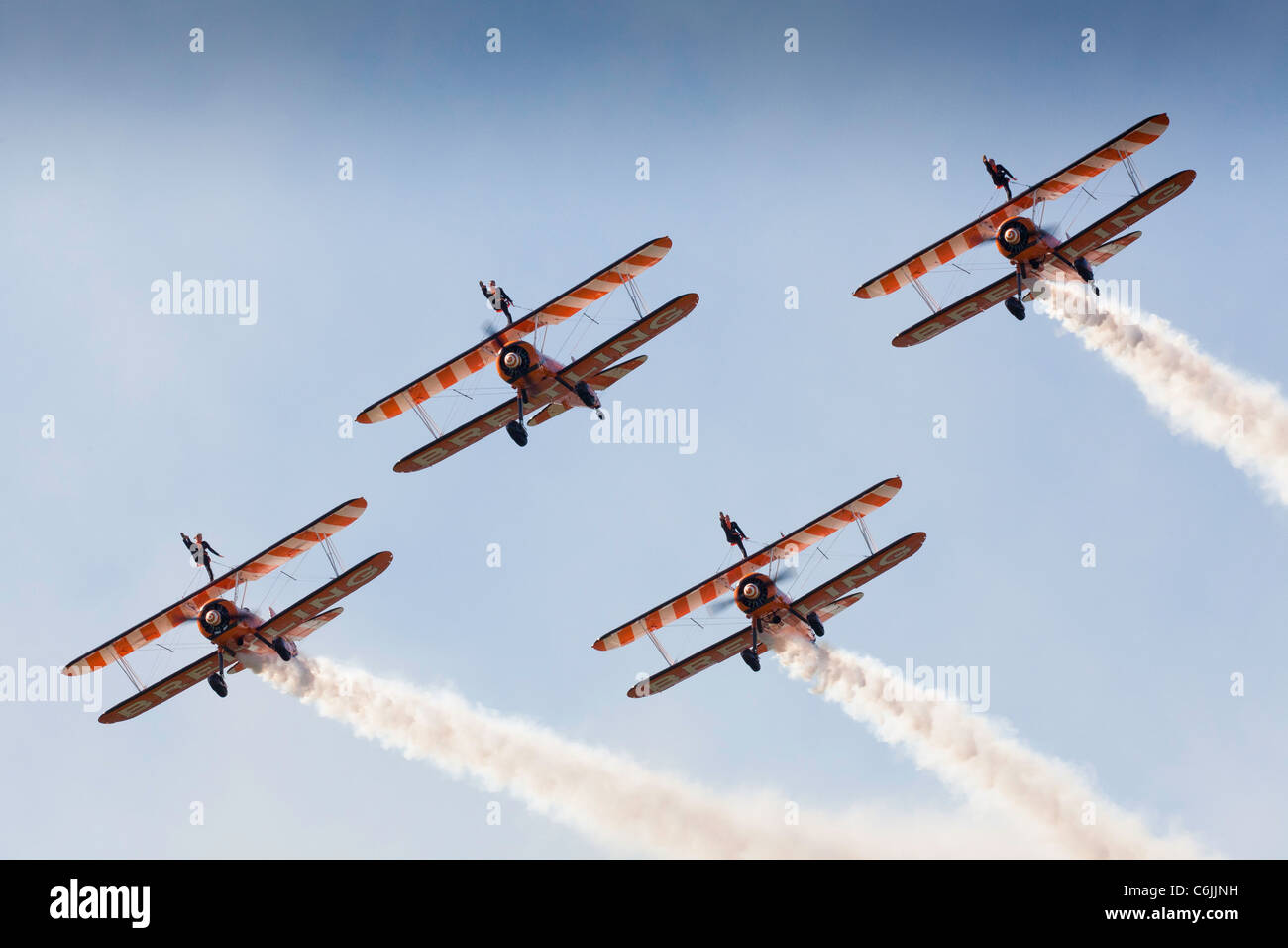 The Breitling wingwalking team overhead Shoreham airfield Stock Photo