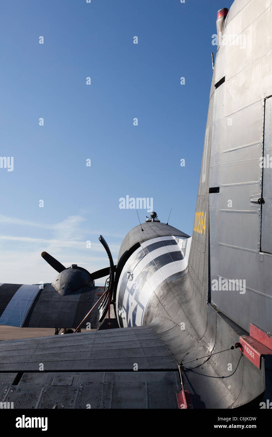 A World War Two Dakota transport aircraft in D-Day invasion markings at Shoreham airfield in 2011 Stock Photo