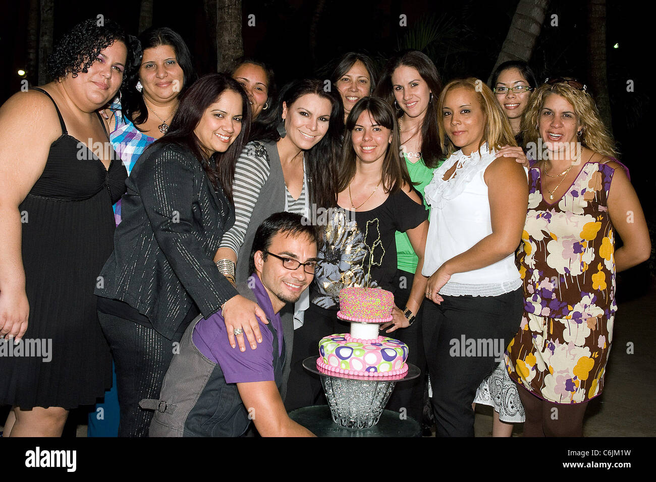 Fans of Olga Tanon surprise her with a birthday cake on the set of the