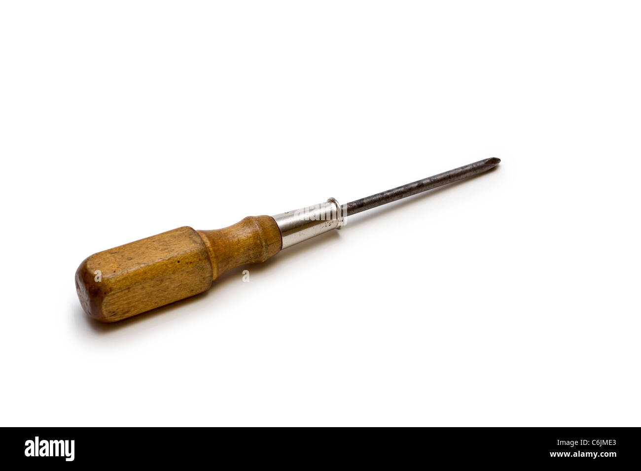Phillips screwdriver with wooden handle on a white background Stock Photo
