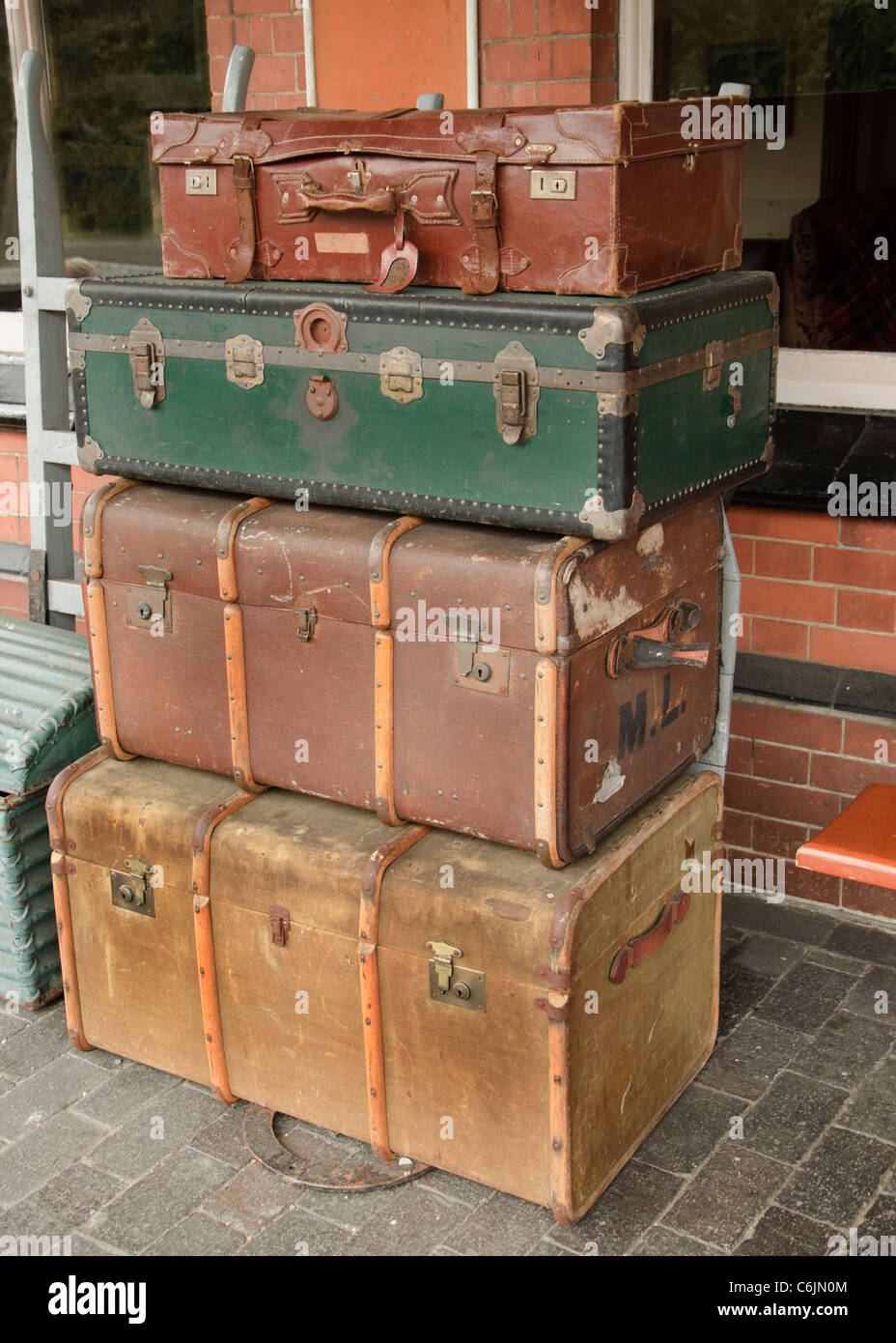 Old style luggage and leather suitcases on railway station Stock Photo -  Alamy