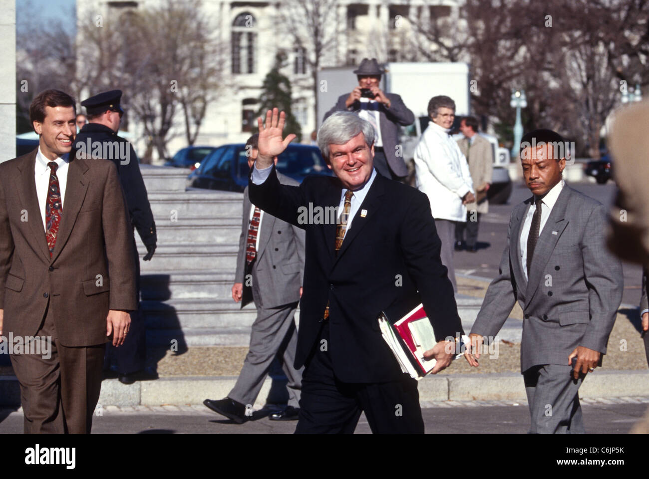 House Speaker Newt Gingrich waves after being reelected Speaker