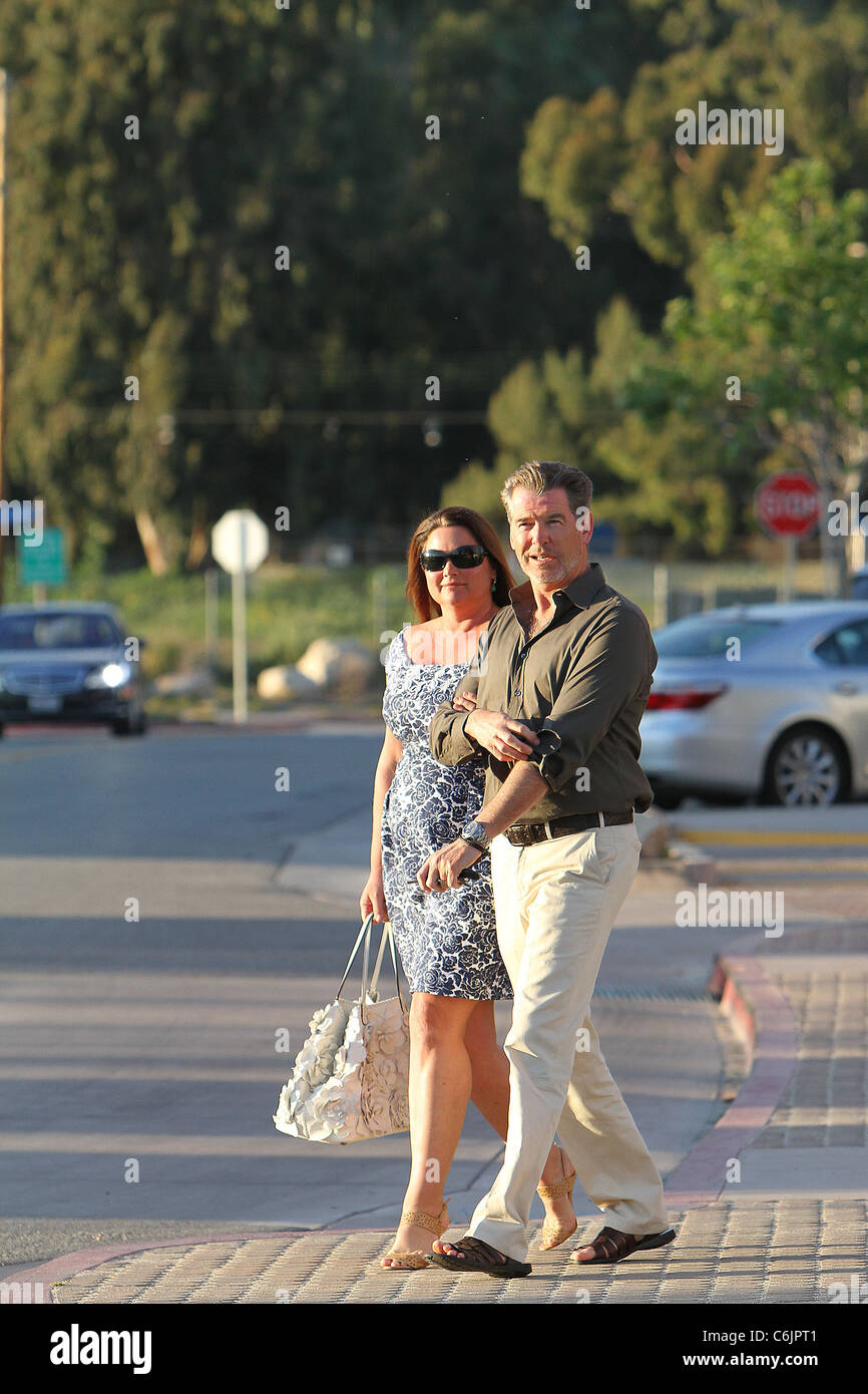 Pierce Brosnan and wife Keely Shaye Smith leaving Malibu Cinemas after watching a screening of 'Green Zone' Los Angeles, Stock Photo