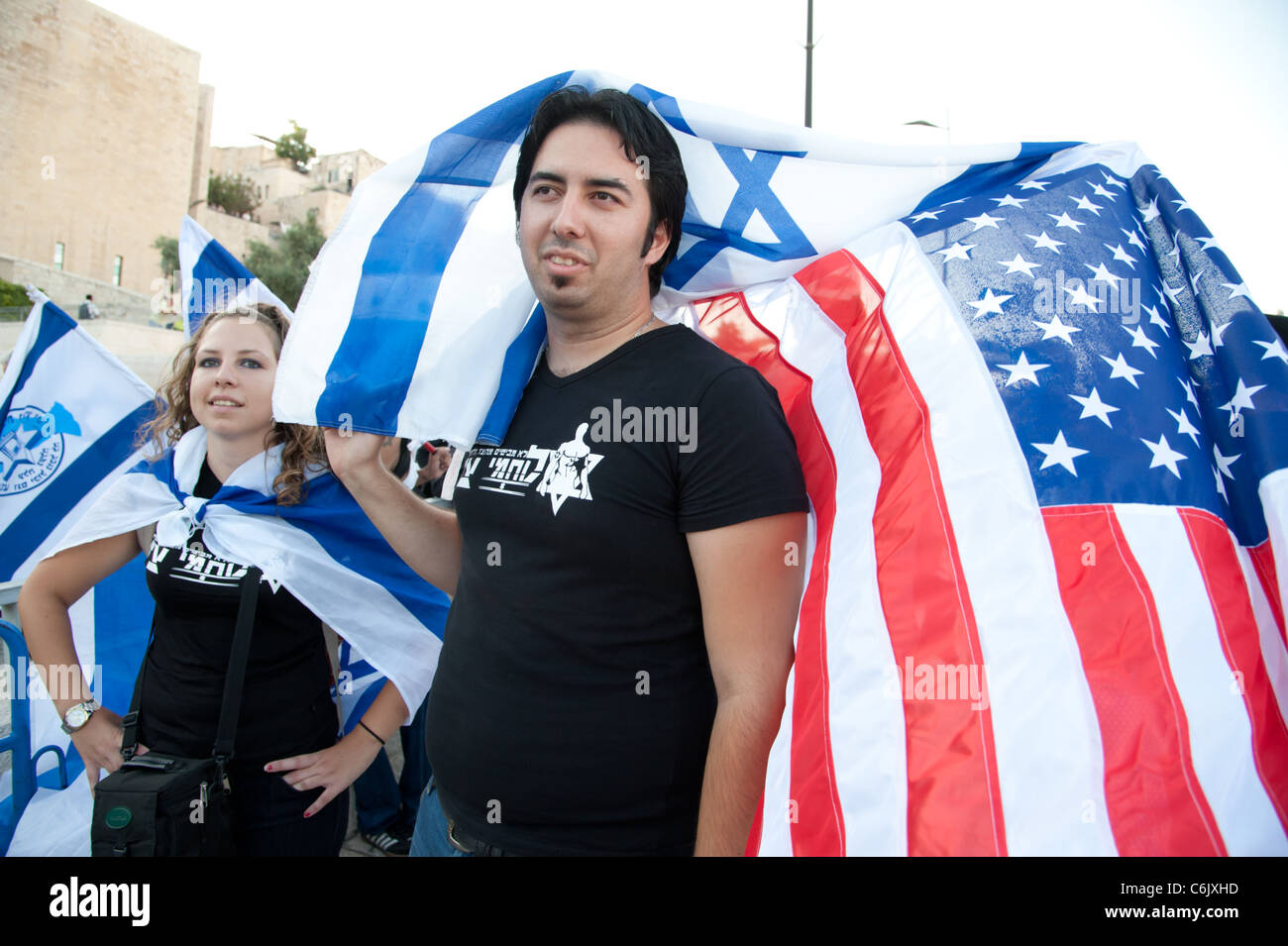 Zionists wave American and Israeli flags at a Glenn Beck rally in Jerusalem. Stock Photo