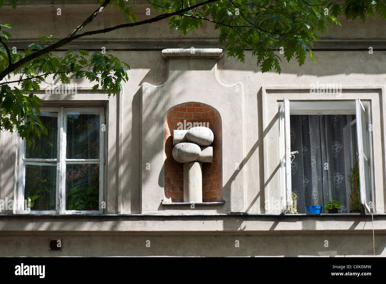 Modern art design on building wall, Old Town, Warsaw, Poland Stock Photo