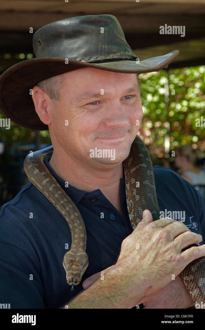 Tourist holding python, Adelaide River, Northern Territory, Australia Stock Photo
