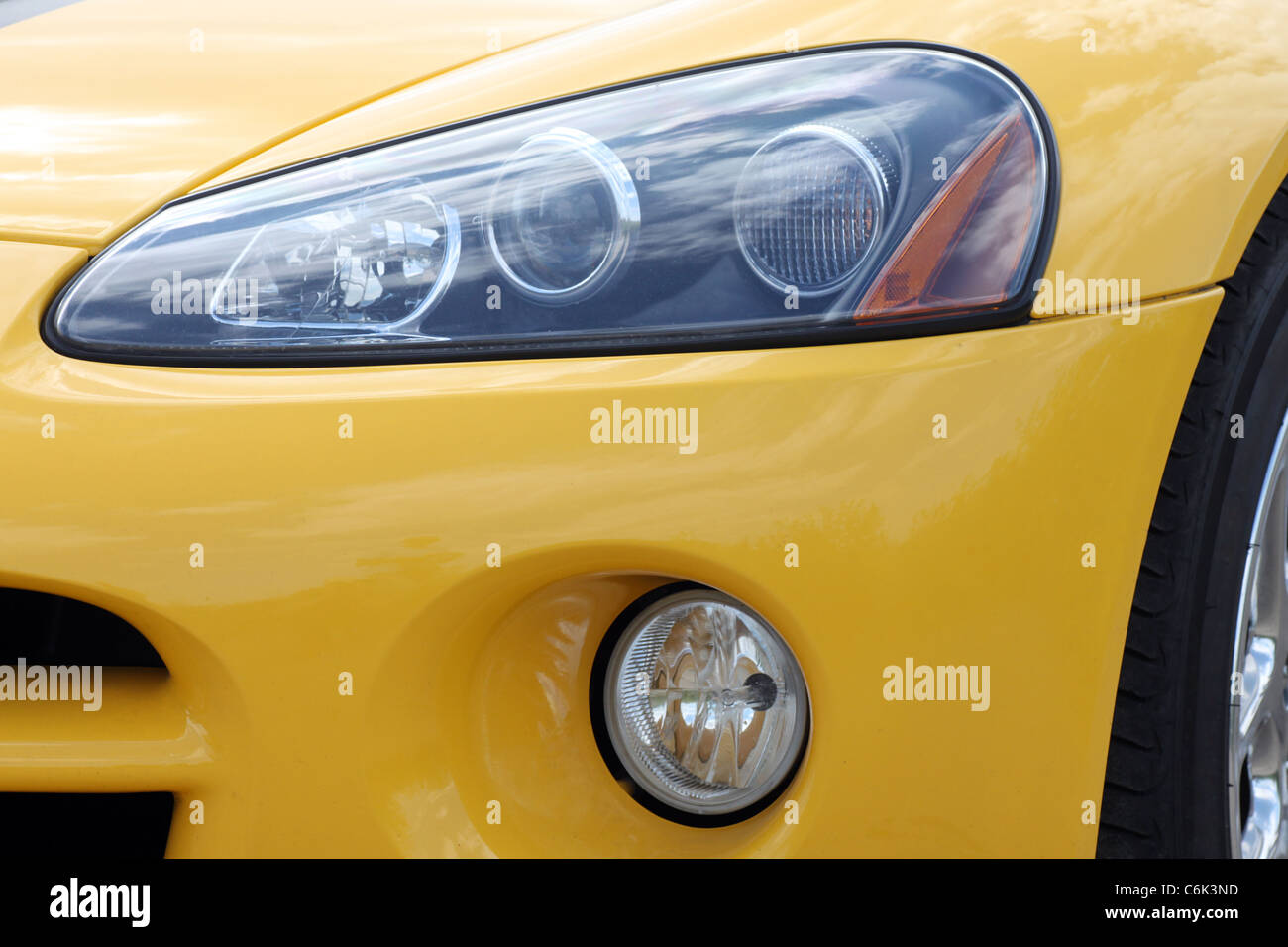 headlight of yellow racing car Stock Photo