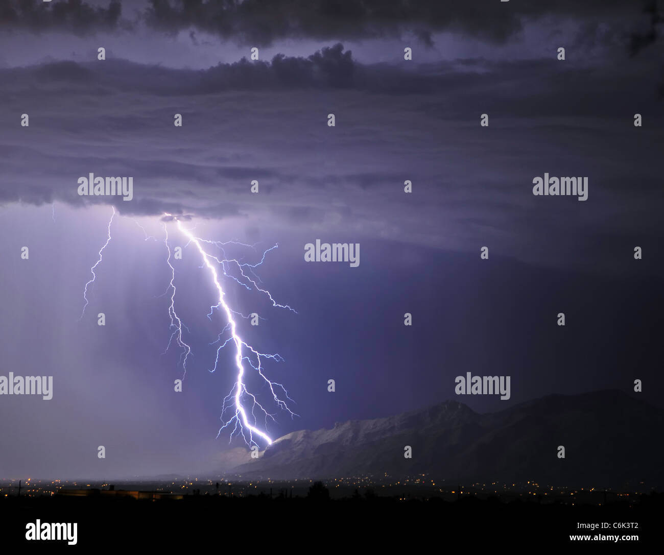Lightning bolt hitting the Catalina Mountains Stock Photo