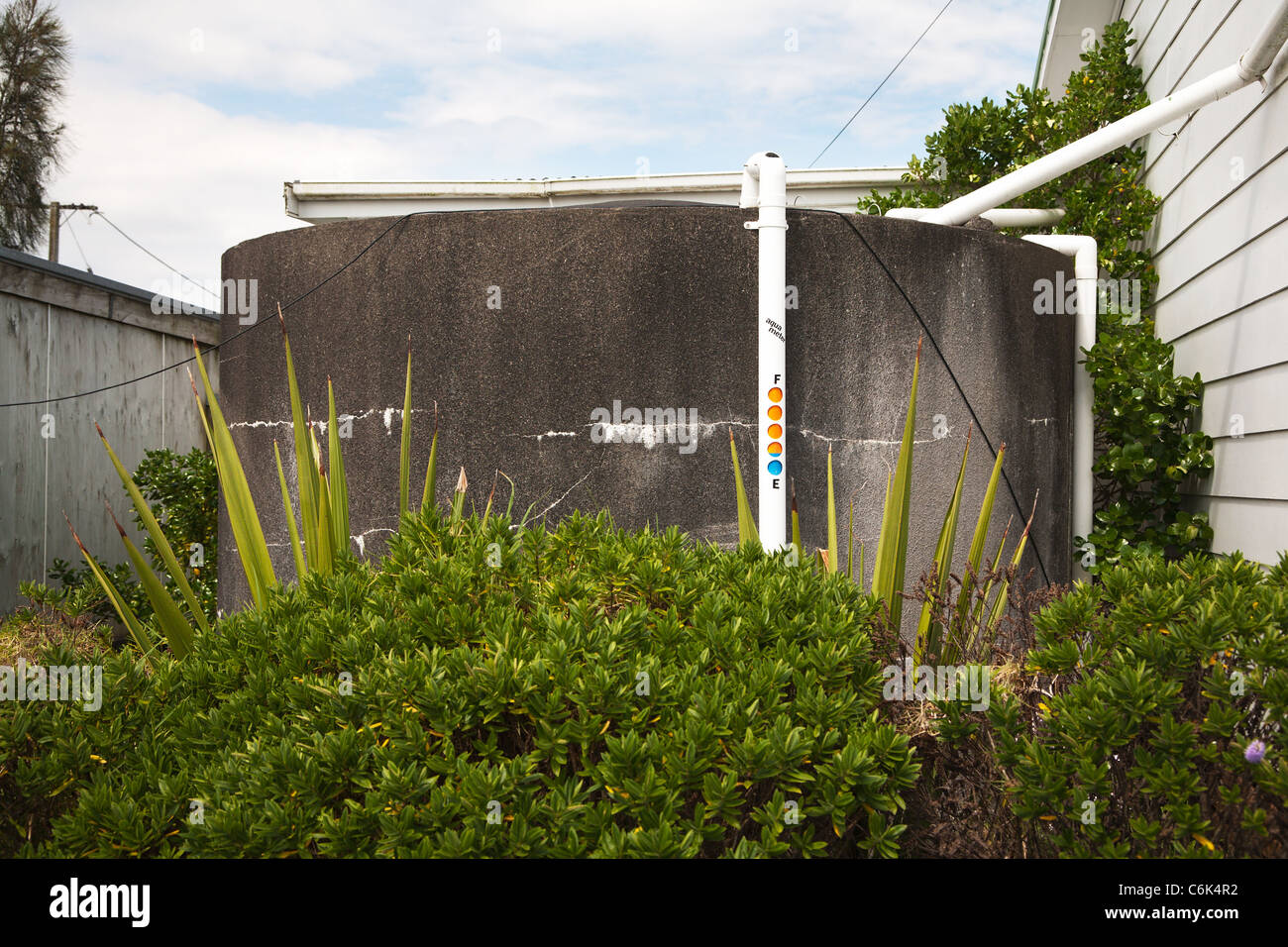 Exterior of a domestic water storage tank and Aqua measure, measuring