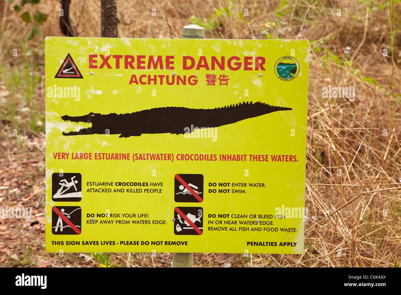 Crocodile warning sign, South Alligator River, Kakadu National Park, Northern Territory, Australia Stock Photo