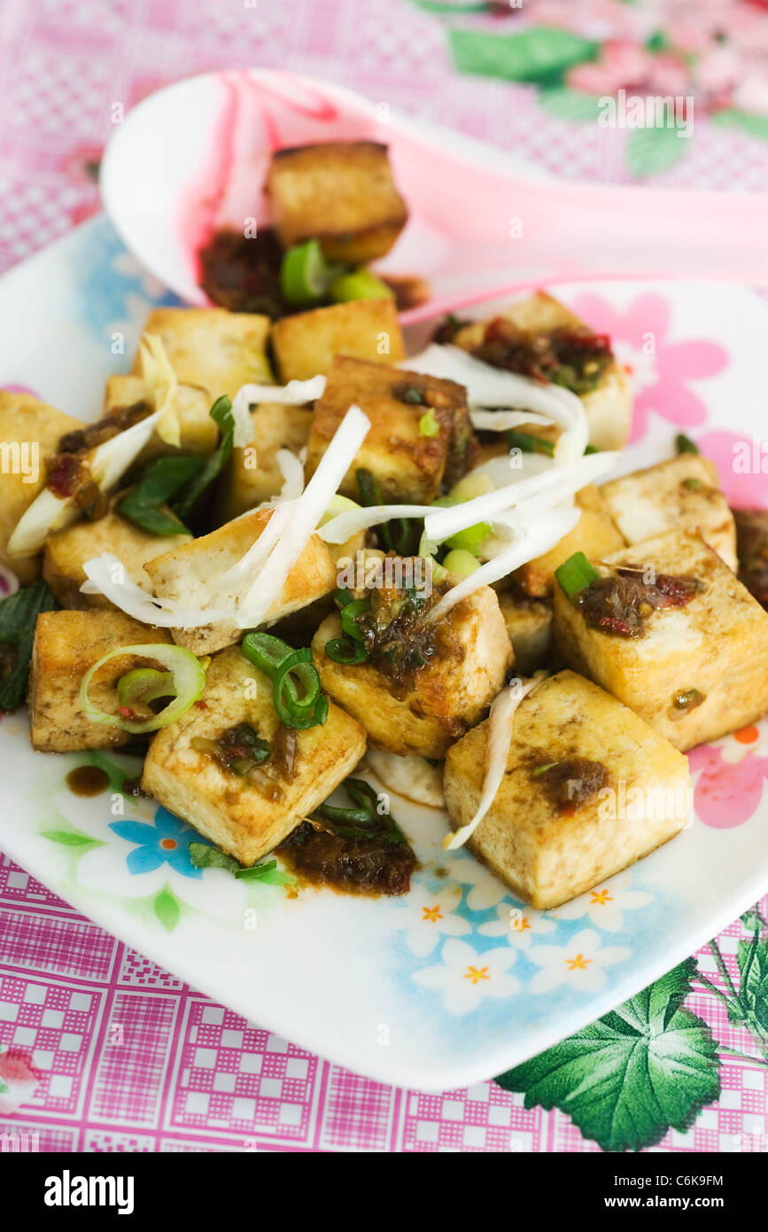 Sauted tofu with soy sauce Stock Photo - Alamy