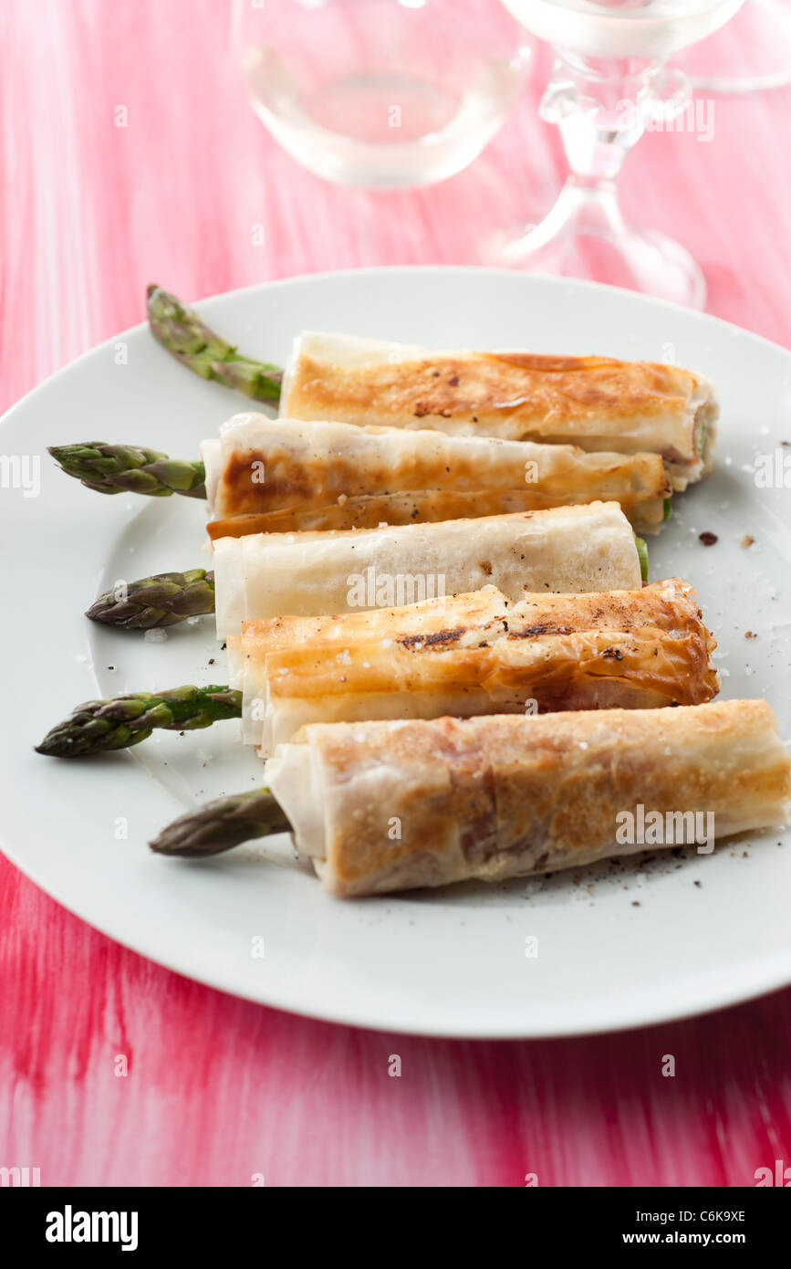 Asparagus wraps Stock Photo