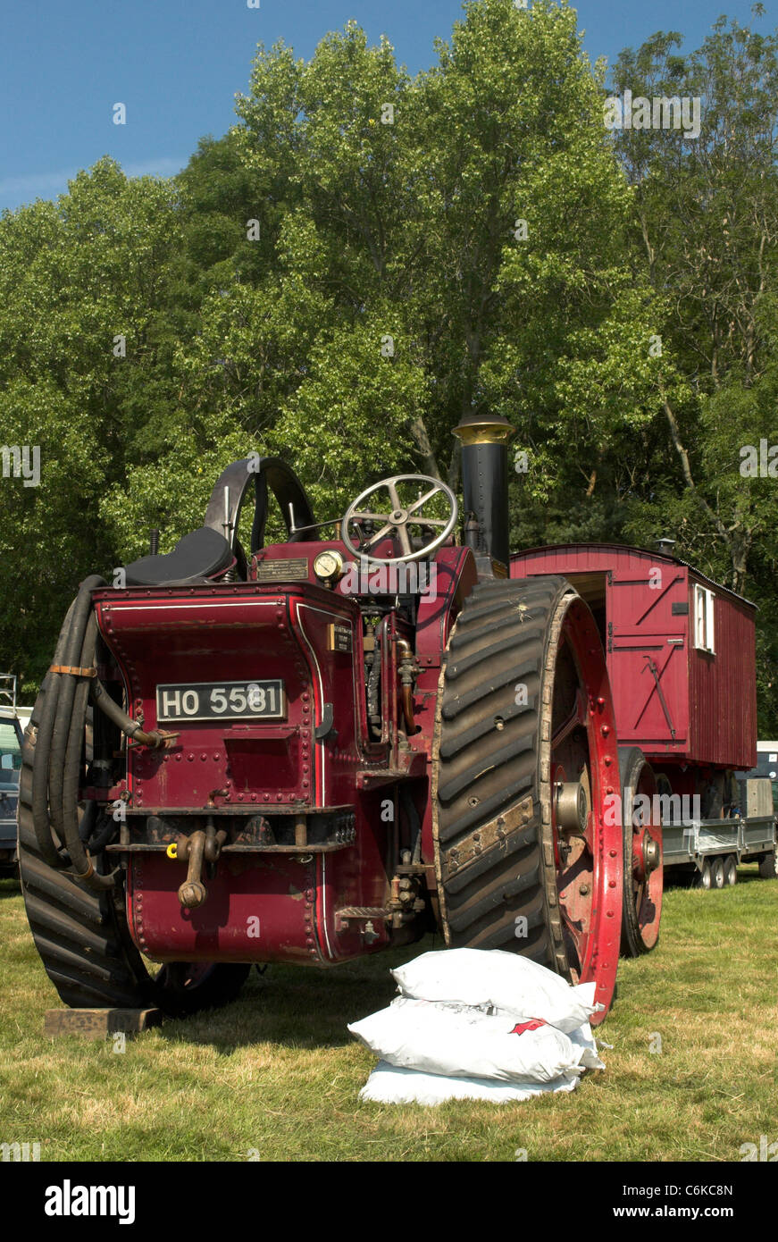 A scene from a Steam Rally featuring a Marshall 7nhp General Purpose Traction Engine - built 1911. Stock Photo