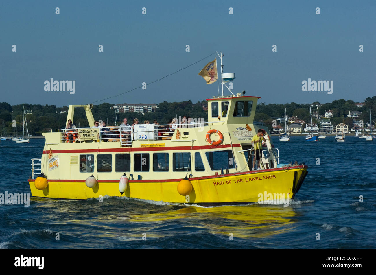 Yellow ferry boat Maid of the Lakelands from Poole Harbour to Brownsea