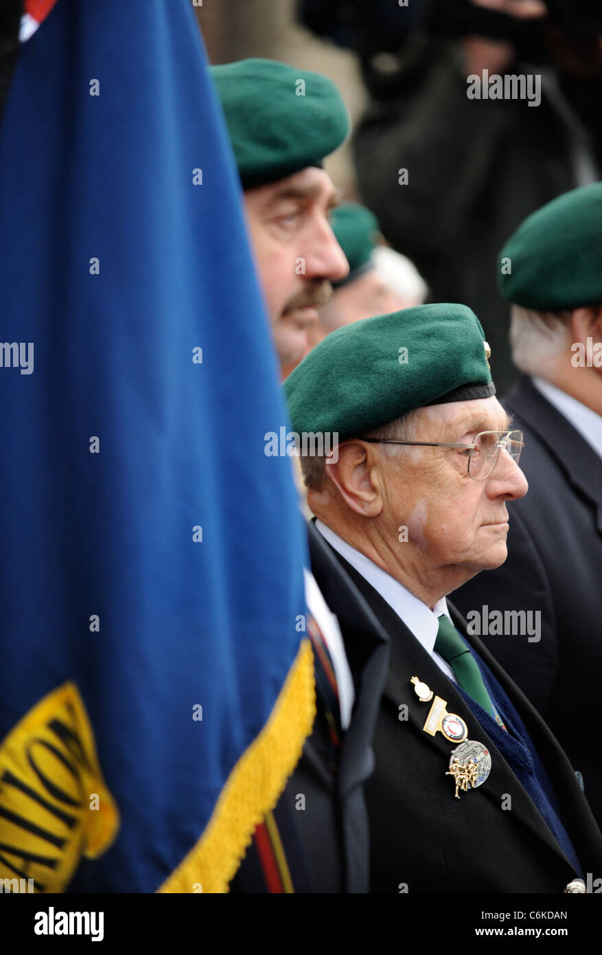 Army veterans in uniform amongst mourners gathered for a repatriation ceremony at Wootton Bassett, Wiltshire UK Dec 2008 Stock Photo