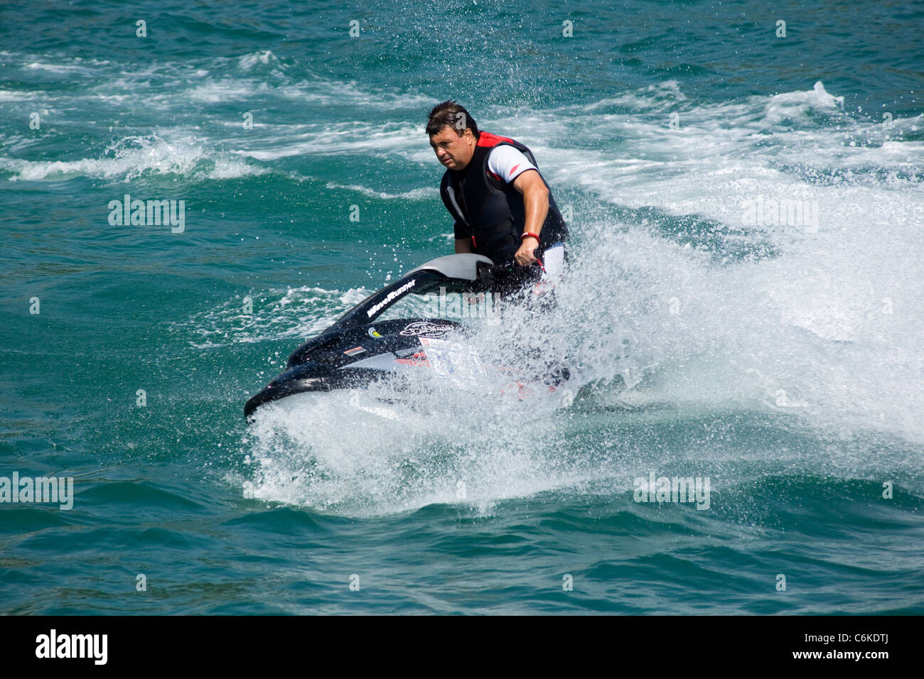 water jet rider, jet skiing, sea spray watersports Stock Photo Alamy