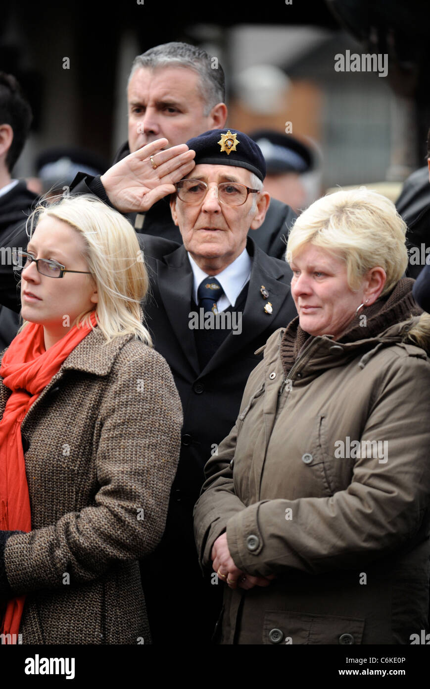 An army veteran in uniform amongst mourners gathered for a repatriation ceremony at Wootton Bassett, Wiltshire UK Dec 2008 Stock Photo