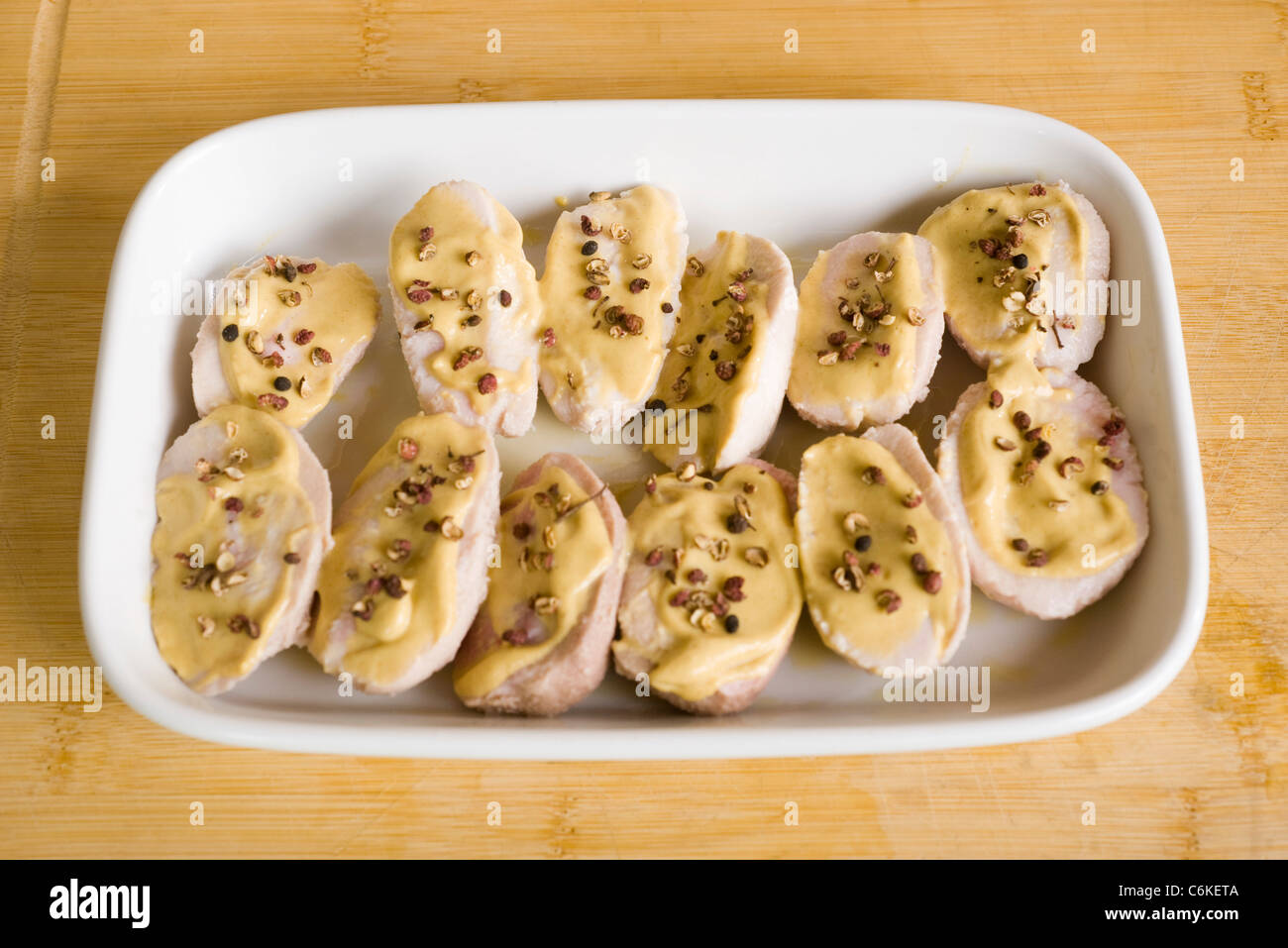 Lamb fries with mustard Stock Photo Alamy