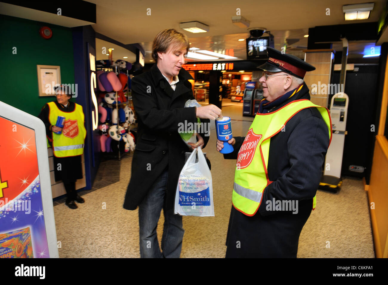 The Salvation Army collecting at a motorway service station Dec 2008 UK Stock Photo
