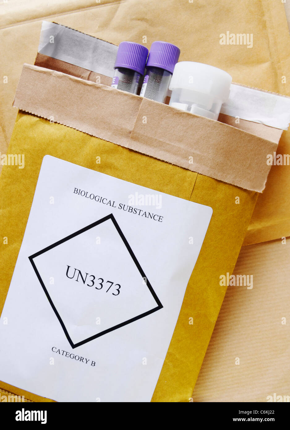 Blood sample bottles in padded envelope marked biological substance