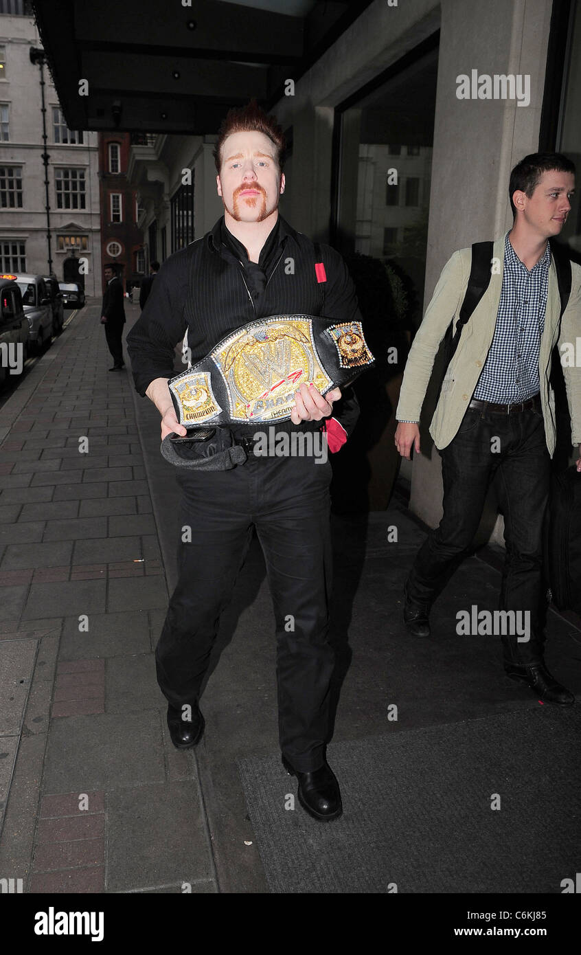 WW Champion Wrestler Stephen 'Seamus' Farrelly with his title belt outside The May Fair Hotel in London London, England - Stock Photo
