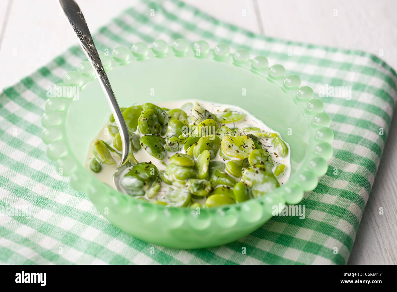 Broad beans with poppy seeds Stock Photo