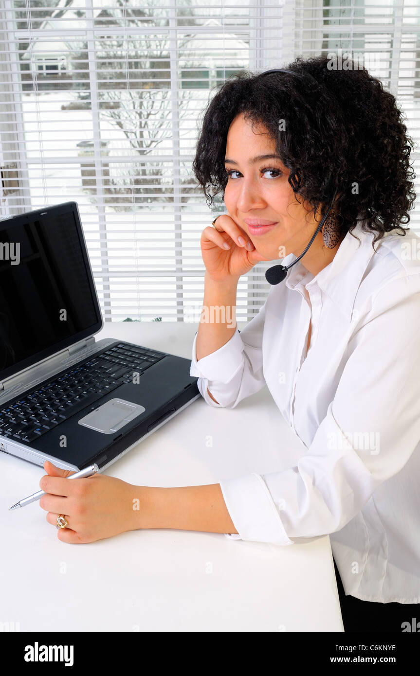 Beautiful African American Call Center Agent Wearing A Hands Free ...