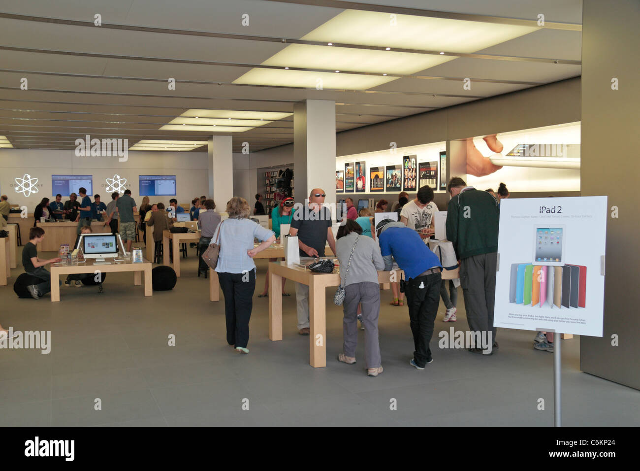Inside the official Apple Store in SouthGate Bath shopping centre, Bath, UK Stock Photo
