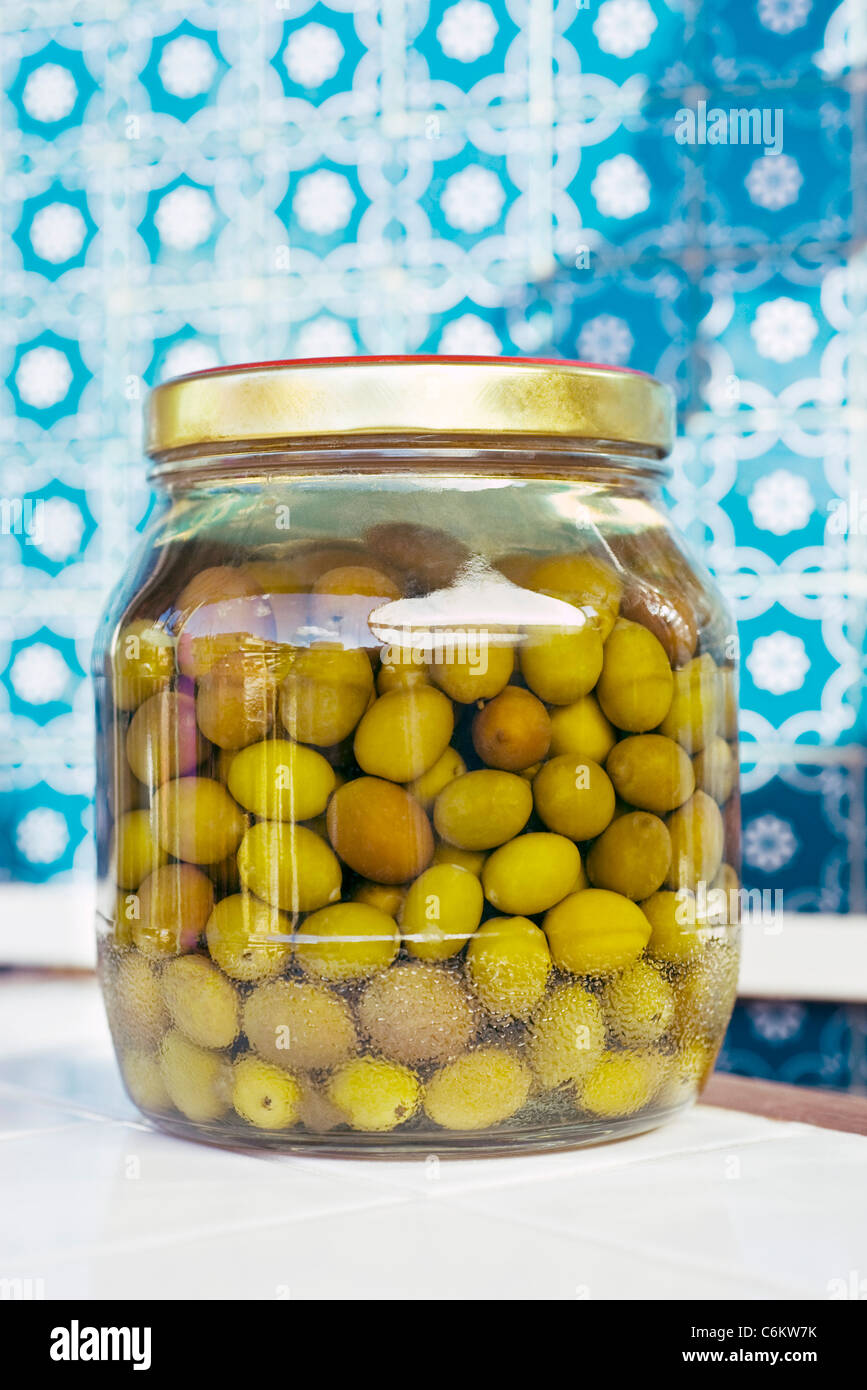 Green olives in jar Stock Photo Alamy
