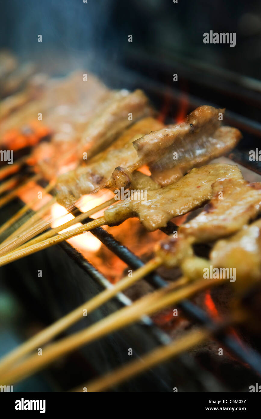 Pork skewers on barbecue grill Stock Photo Alamy