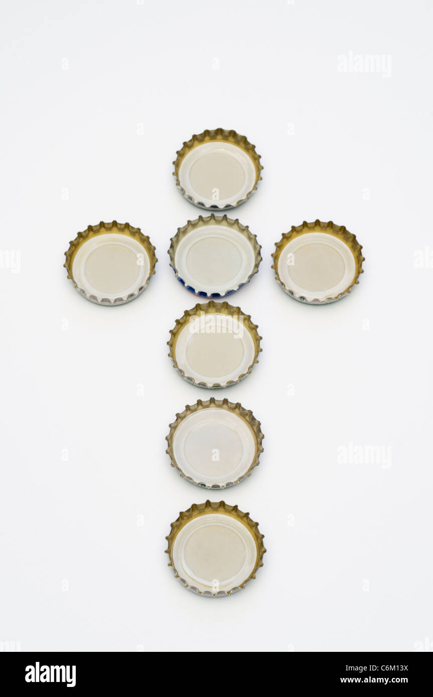 cross made with bottle caps Stock Photo
