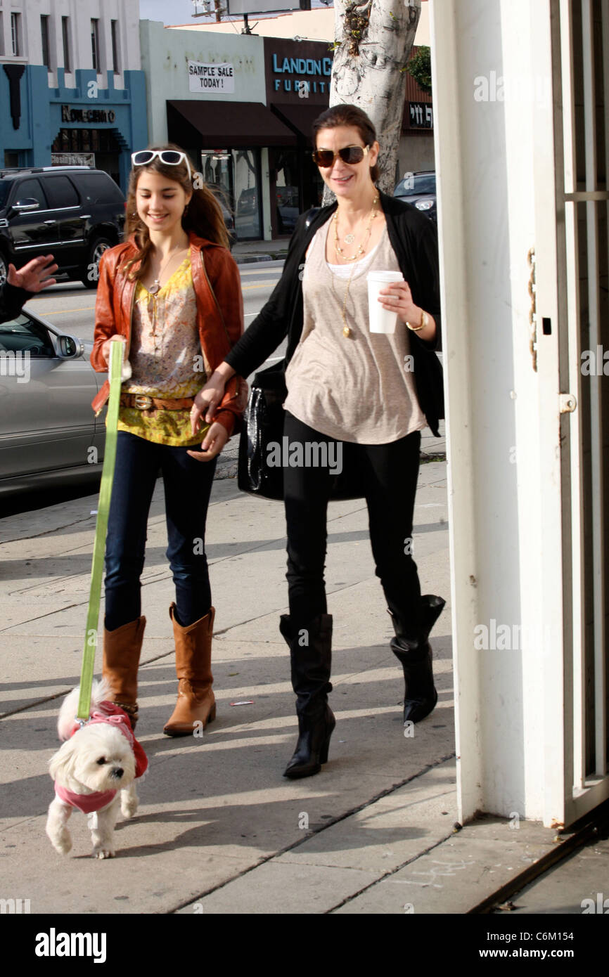 Teri Hatcher and daughter Emerson Rose hold hands after eating lunch at