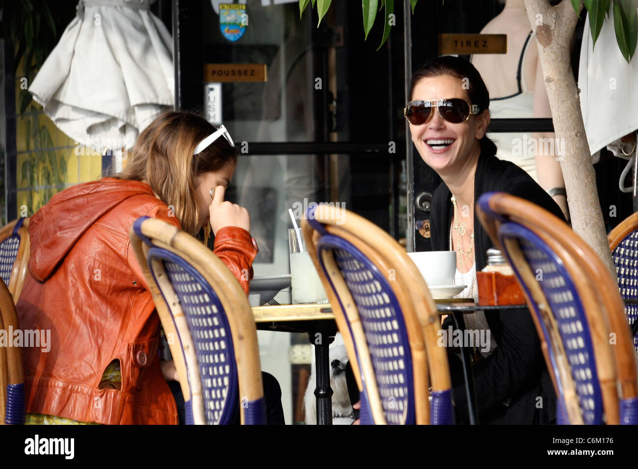 Teri Hatcher and daughter Emerson Rose eating lunch at the Midi Cafe with their dog Los Angeles, California - 04.02.10 Owen Stock Photo
