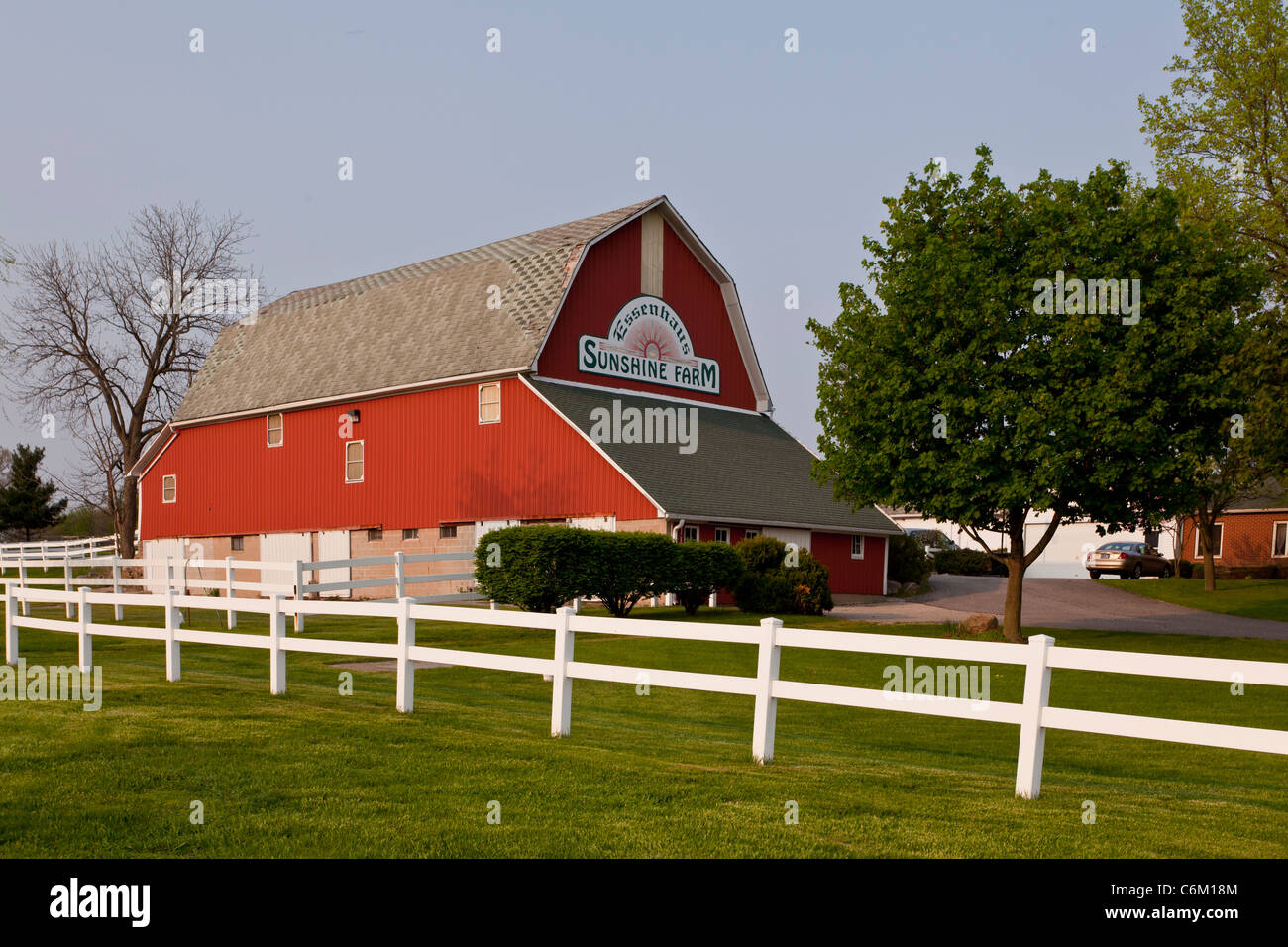 A red barn at the Sunshine Farm and Essenhaus in Middlebury, Indiana, USA. Stock Photo